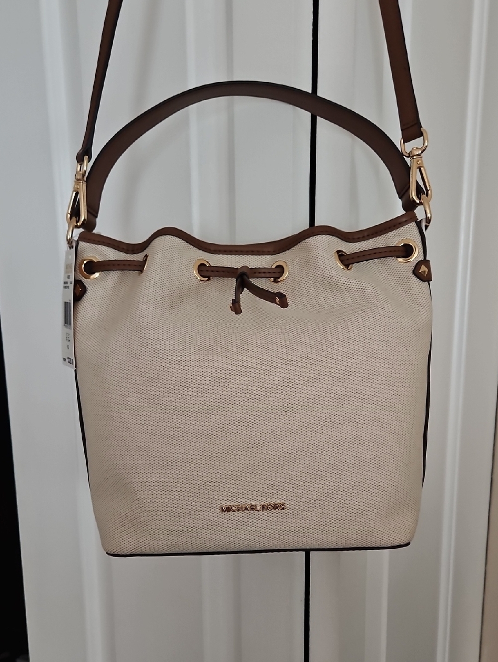 Authentic Michael Kors Cream Canvas Drawstring Bucket Bag with Brown Trim
